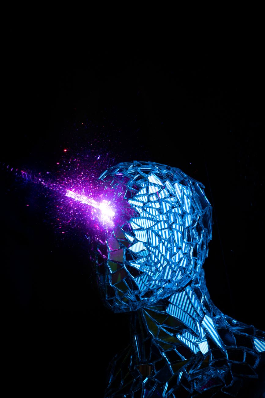 the cover of the album with a man in a blue suit with purple lights