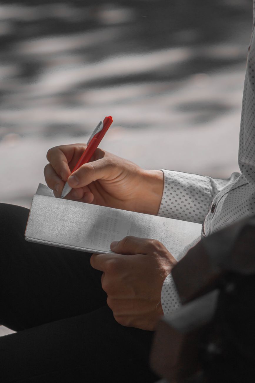 close up of writing on a notebook